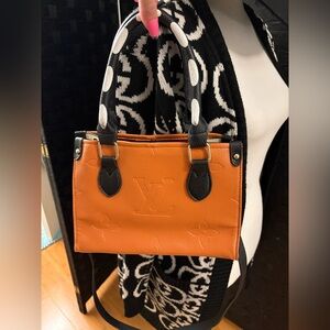 Elegant Orange and Black Shoulder Bag